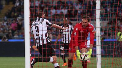 Giorgio Chiellini of Juventus begins to celebrate after levelling it 1-1 for his side in the Coppa Italia final on Wednesday night in Rome. Alessandro di Meo / EPA