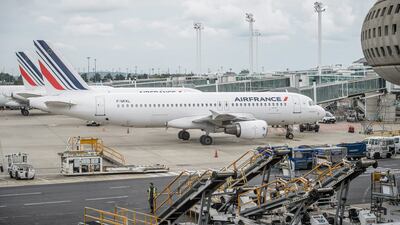 Air France planes parked at the Charles de Gaulle International Airport in Roissy, near Paris. The carrier's pilots have approved the company's plan to launch a new budget airline. Christophe Petit Tesson / EPA