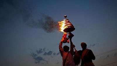 Hindu priests on Sunday perform a ceremony in Allahabad for the 16 victims of Hyderabad bombings last week. Jitendra Prakash / Reuters