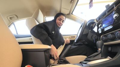 A Saudi woman buckles up before a driving test at the General Department of Traffic in the Saudi capital of Riyadh. CIC / Ministry of Media