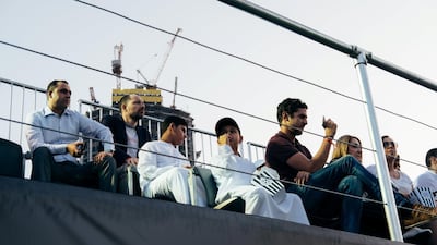 Spectators watch the Match of Friendship from the stands. Anna Nielsen For The National
