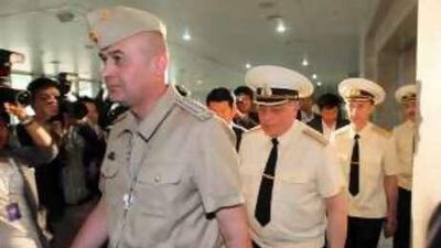 Investigators from Russia arrive at the South Korean defence ministry building in Seoul.