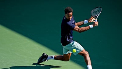 Gael Monfils of France hits a backhand return. AP