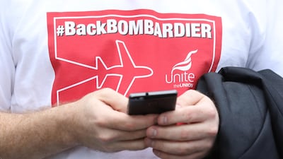 A UK demonstrator at a protest in support of Bombardier outside the Houses of Parliament in London on Wednesday. Luke MacGregor / Bloomberg