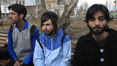 From left, Gulzar Ahmed, Muteebul Majid and Aijaz Bhat were among the dozens of students expelled from their university and threatened with sedition charges because they cheered for the Pakistani cricket team during a televised match against India. Dar Yasin / AP Photo / March 6, 2014