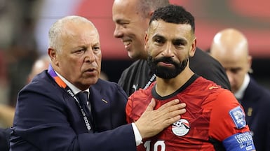 Mohamed Salah is congratulated by Hany Abo Rida, president of the Egyptian Football Association, after his team secure their place in the last 16 of the World Cup. EPA