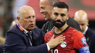 Mohamed Salah is congratulated by Hany Abo Rida, president of the Egyptian Football Association, after his team secure their place in the last 16 of the World Cup. EPA