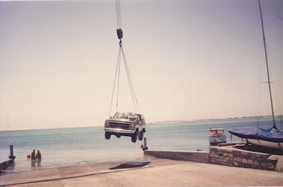 An SUV being pulled out of the water at The Club in the 80s in Abu Dhabi