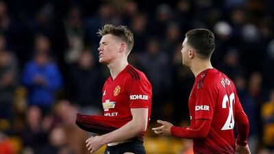 Manchester United's Scott McTominay looks dejected after the match. Reuters