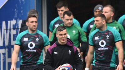 Ireland fly-half Johnny Sexton arrives on the pitch for a training session at Twickenham. AFP
