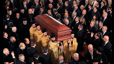 Lebanese Greek Orthodox clergymen carry the coffin of Patriarch of Antioch and all the East, Ignatius Hazim IV, during his funeral at the Saint Nicolas Church in Beirut, Lebanon. Bilal Hussein / AP Photo