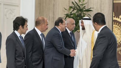 Sheikh Mohamed bin Zayed Al Nahyan greets a guest at the Heliopolis Palace. Rashed Al Mansoori / Crown Prince Court - Abu Dhabi