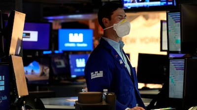 A trader on the floor of the New York Stock Exchange. During high inflationary periods, growth stocks tend to be hit harder than value stocks. AFP