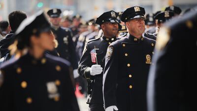 Members of the New York City Police Department march in the Veterans Day Parade on November 11, 2019 in New York City. AFP