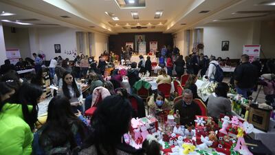 Syrians shop at a charity bazaar held at the Patriarchate of Antioch and All The East in Damascus, Syria, December 2. EPA