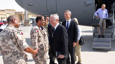 US Defence Secretary Jim Mattis (C) and NATO Secretary General Jens Stoltenberg arrive at the Al Udeid US military base in Qatar on September 28, 2017. Thomas Watkins / AFP