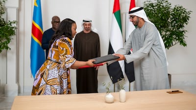 Sheikh Mohamed and Mr Tshisekedi witness the exchange conducted on behalf of UAE by Minister of State Sheikh Shakhbout bin Nayhan