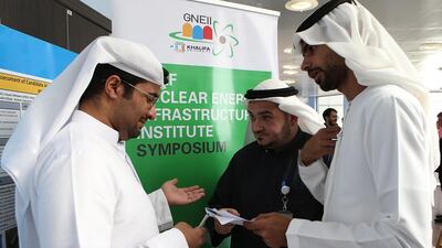 Rashid Al Suwaidi, left, Hesham Saeed, centre and Hassan Al Maeeni at the nuclear symposium in the capital. Ravindranath K / The National