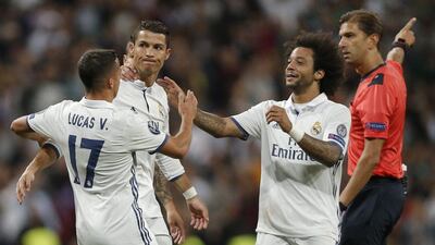 Cristiano Ronaldo scored a free-kick to equalise against Sporting Lisbon as Real Madrid left it late to win. Daniel Ochoa de Olza / AP Photo