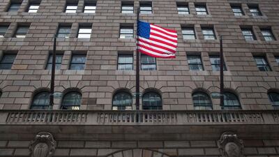 US flag flying at the Federal Reserve Bank of New York - US Treasury department says there are no plans to delist Chinese firms from the US exchanges. AFP