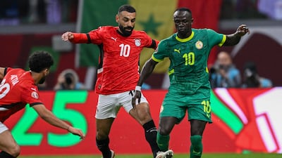 Egypt's Mohamed Salah and Senegal's Sadio Mane vie for the ball during the Afcon semi-final in Tangiers. AFP