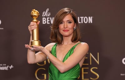 Rose Byrne with her Best Actress in a Motion Picture – Musical or Comedy award for If I Had Legs I’d Kick You. AFP