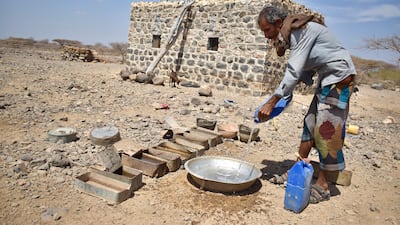 Abdullah, 35, pours water for his goats into empty storage containers for bullets and soldier’s helmets, the remnants of Yemen’s ongoing seven-year conflict. He gestures to an anti-tank mine lying on the ground nearby: “There are mines everywhere here. Sometimes our sheep or camels set off the landmines and they explode, but you can see them everywhere on the ground.” Photo: Cherry Franklin for DRC