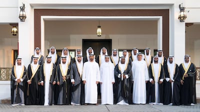Sheikh Mohamed bin Zayed, Ahmed Al Zaabi, Deputy Minister of Presidential Affairs (7th L) and Jaber Al Suwaidi, General Director of the Crown Prince Court - Abu Dhabi (9th L), stand for a photograph during a mass wedding held at Majlis Al Manhal. Rashed Al Mansoori / Ministry of Presidential Affairs