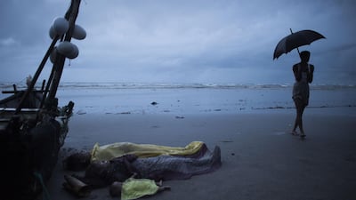 Bodies of Rohingya Muslim refugees lay on the shore of Inani beach, near Cox's Bazar, Bangladesh. Fred Dufour / AFP Photo / March 12, 2017