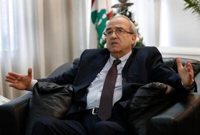 Lebanon’s caretaker Justice Minister Albert Serhan speaks during an interview with the Associated Press in Beirut on January 2, 2020. AP
