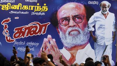 Indian fans of Bollywood star Rajinikanth gather outside a cinema on the first day of release of his new Tamil-language film "Kaala", in Chennai. Arun Sankar / AFP