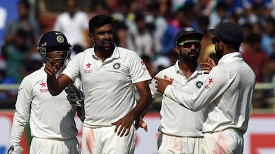 Ravichandran Ashwin, second left, has excelled with the bat and ball, while captain Virat Kohli, second right, has notched big scores to help India into a commanding position against England in the second Test. Prakash Singh / AFP