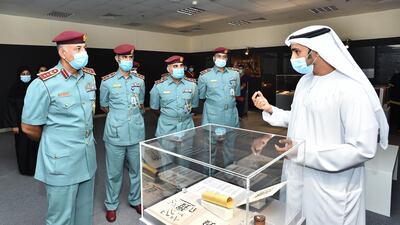 Nasir Al Darmaki, strategic planning department manager of Sharjah Museums Authority, with police officers. All photos by Sharjah Museums Authority
