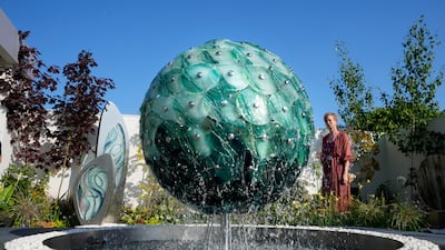 An outdoor glass water feature by artist Carrie Anne Funnell. AP
