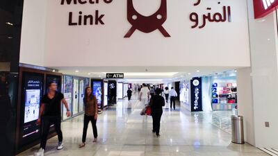It takes slightly less than 15 minutes to walk the 820 metre air-conditioned bridge between the station and world’s biggest mall. Sarah Dea / The National