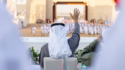 Sheikh Mohamed waves during the Union Parade. Ryan Carter / Presidential Court
