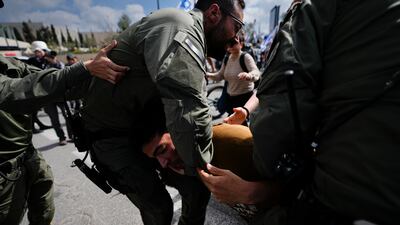 Israelis scuffles with police outside the parliament in Jerusalem. AP