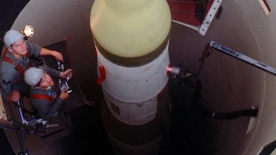 US air force technicians check on an LGM-30F Minuteman III in its silo in Missouri, Courtesy : USAF