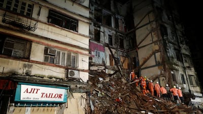 Witness said there were five or six families living the building when it collapsed. Reuters