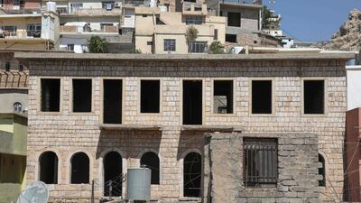 Cooling limestone used in its renovation is sourced from the surrounding mountains. "Limestone is easy to use. It's cheap and available," said engineer Jamil Siddik, 63.