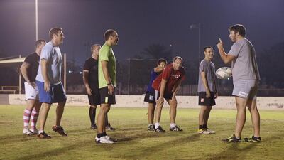 Members of the RAK Goats rugby team practises on a field at the Ras Al Khaimah Academy. Antonie Robertson / The National