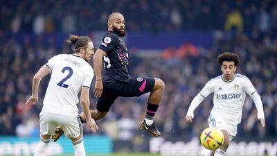 Brentford's Bryan Mbeumo takes on Leeds United's Luke Ayling and Tyler Adams. PA