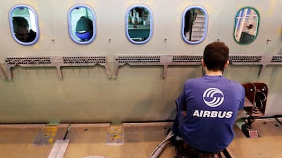 An Airbus employee works in a fuselage section of an A320 Airbus at the Airbus facility in Montoir-de-Bretagne near Saint-Nazaire, France. The company has been unified as one entity. Stephane Mahe / TPX