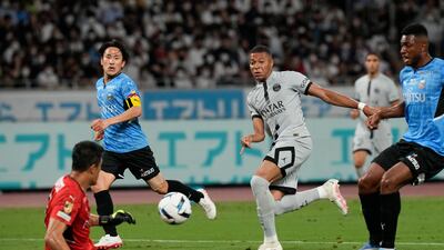 PSG's Kylian Mbappe sees his shot saved by Kawasaki Flontale goalkeeper Jung Sung-ryong. AP