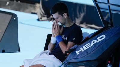 Novak Djokovic rests during a practice session on Rod Laver Arena. AP Photo