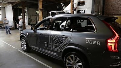 An Uber driverless car at a garage in San Francisco. Uber said its losses narrowed for the quarter over the same period last year. (Eric Risberg / AP