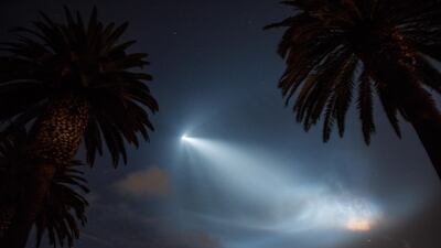 A SpaceX Falcon 9 rocket lights up the sky after its launch from Vandenberg Air Force base as seen in the sky over Corona del Mar, California. EPA