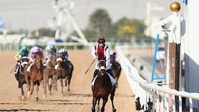 Sam Hitchcott rides One Man Band to victory in the Godolphin Mile Sponsored By Meydan Sobha as part of the Dubai World Cup at Meydan Racecourse on March 26, 2016 in Dubai, United Arab Emirates. (Photo by Warren Little/Getty Images)