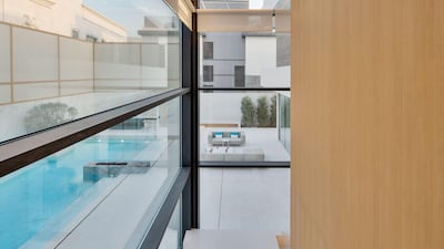 A view of the garden from inside the villa. Courtesy Luxhabitat Sotheby's International Realty