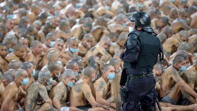 Gang members are secured during a police operation at Izalco jail during a 24-hour lockdown ordered by El Salvador's President Nayib Bukele in Izalco, El Salvador. Reuters